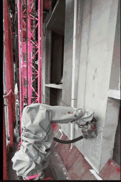 外墻錯臺打磨機器人作業 壓縮.gif